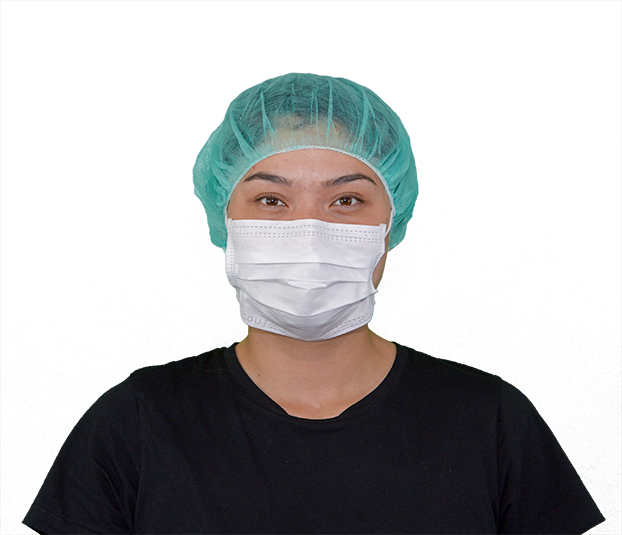 Masque, 18 cm, avec bandeau elastiquePerson trägt einen weissen hygienischen Reinraum-Mundschutz, doppelt verpackt und latexfrei und eine grünen Reinraum-Kopfhaube.